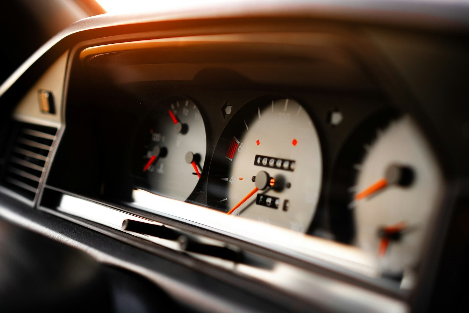 a close up of a speedometer in a car